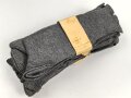 Sechs Paar graue Wollsocken aus der Zeit des 2. Weltkrieg. Ungebraucht, in der originalen Papierbanderole, diese leicht beschädigt