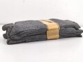 Sechs Paar graue Wollsocken aus der Zeit des 2. Weltkrieg. Ungebraucht, in der originalen Papierbanderole