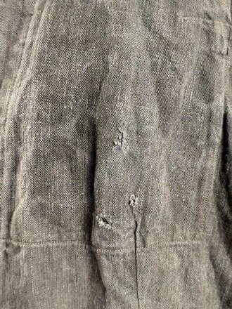 Drillichjacke Wehrmacht, Variante ohne Taschen, wohl Luftwaffe. Getragenes Kammerstück in gutem Gesamtzustand