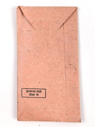 Schutzwall Ehrenzeichen, im Bandring markiert L/15 für Friedrich Orth , Wien. In der zugehörigen Tüte, mit Band