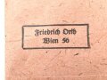 Schutzwall Ehrenzeichen, im Bandring markiert L/15 für Friedrich Orth , Wien. In der zugehörigen Tüte, mit Band