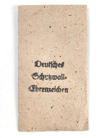 Schutzwall Ehrenzeichen, Zink ohne Band, in originaler Tüte, der Hersteller warum auch immer ausgeschnitten