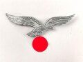 Adler für eine Schirmmütze der Luftwaffe. Zink versilbert, ein Splint fehlt