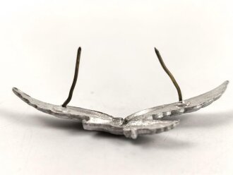 Adler für eine Schirmmütze der Luftwaffe. Aluminium, entnazifiziert