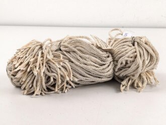 150 Stück Kunstfaserstrippen, Länge je etwa 60-65cm , mit origialem Herstelleretikett Hermann Metzner Grottau, "Kriegsauftrag", datiert 1944