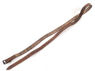 Schnallriemen  Wehrmacht, ungeschwärztes Leder Breite knapp 2cm, Gesamtlänge 146cm, datiert 1940