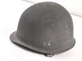 Stahlhelm mit Innenhelm nach dem amerikanischen Modell M1. Originallack, ungereinigtes Stück