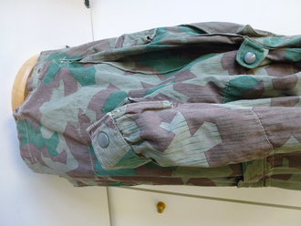 Fallschirmjäger Knochensack Splittertarn, Getragenes Stück mit einigen Schadstellen, alle Reißverschlüsse ( Rapid ) gängig, sämtlich Druckknöpfe vorhanden, farbfrisches Stück