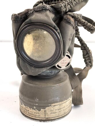 S-Maske Degea datiert 1938, mit Filter, in lederner...