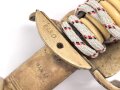 Kaiserliche Marine, Säbel  für Offiziere mit Peitschengehänge und Portepee. Neuzeitliche Fertigung . Gebraucht, Scheide leicht verzogen, die Arretierung oben greift nicht.