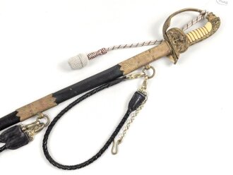 Kaiserliche Marine, Säbel  für Offiziere mit Peitschengehänge und Portepee. Neuzeitliche Fertigung . Gebraucht, Scheide leicht verzogen, die Arretierung oben greift nicht.