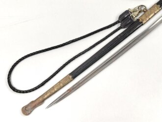 Kaiserliche Marine, Säbel  für Offiziere mit Peitschengehänge und Portepee. Neuzeitliche Fertigung . Gebraucht, Scheide leicht verzogen, die Arretierung oben greift nicht.