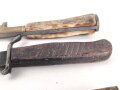 1. Weltkrieg, defekter Grabendolch, dazu vier jagdliche Messer