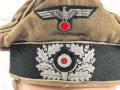 Schirmmütze alter Art für einen Offizier der Infanterie. Schweißband defekt, Schirm fehlt. Die Effekten original vernäht, Kopfgrösse gemessen 55