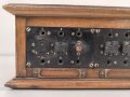 Klappenschrank, sicherlich zivile Ausführung. Maße etwa 15 x 46 x 15cm. Ungereinigt, Funktion nicht geprüft