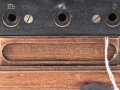Klappenschrank, sicherlich zivile Ausführung. Maße etwa 15 x 46 x 15cm. Ungereinigt, Funktion nicht geprüft