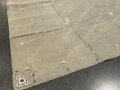 Feldgraue Zeltbahn im Stil der Deutschen Plane im 1. Weltkrieg. Undeutliche Stempelung, Alter und Herkunft unbekannt