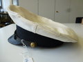 Kriegsmarine Schirmmütze mit weißem Bezug. Getragenes Stück