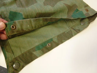 Fallschirmjäger Knochensack Splittertarn. Farbfrisches Stück mit 4 weißen Kunststoff RiRi Reissverschlüssen und Prym 6 Druckknöpfen. Der Adler nicht Originalvernäht. Schönes Stück, Grösse Medium-Large. Alle Reissverschlüsse gängig