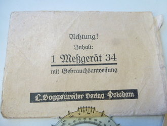 Messgerät 34 in Tüte und Umverpackung