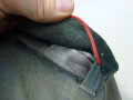 Wehrmacht Feldbluse eines Angehörigen der russischen Befreiungsarmee , alle Effekten Maschinenvernäht. Rahmenpersonal ?