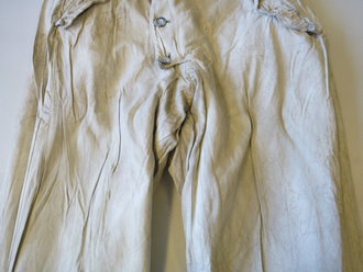 Winterwendehose Splittertarn-weiß, getragenes Stück mit diversen Reparaturstellen. Hosenträger Original