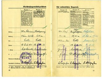 Deutsches Radsport-Jugend-Abzeichen in Bronze Urkundenheft sowie  Leistungsbuch durchs Leben, datiert 1933/34