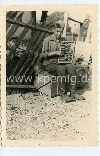 Foto "gescheiter Russe mit Rechenschieber"...