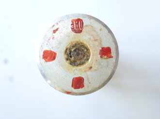 Rauchspurpatrone rot, Abgeschossene, leere Aluminiumhülse datiert 1944