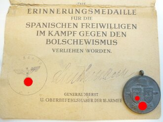 Erinnerungsmedaille für die spanischen Freiwilligen in Kampf des Bolschewismus. Medaille aus Zink, die Urkunde ausgestellt 1943