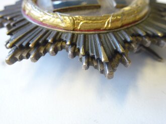 Deutsches Kreuz in Gold, schweres Stück Hersteller 1 Deschler & Sohn, München, die Emaille z.T. repariert, sonst gut