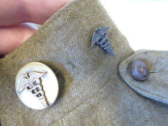 U.S. WWI, 90Th Division group. Tunic and pants with hard to find belt, Dog tags, Discarge and booklet. Nice group, all belongs to Francis L. Wilt