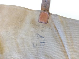 U.S.  WWI, British made for US Officers, haversack. Unique "US" with Broad Arrow marking with company info and 1918 date. NAMED