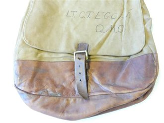 U.S.  WWI, British made for US Officers, haversack. Unique "US" with Broad Arrow marking with company info and 1918 date. NAMED