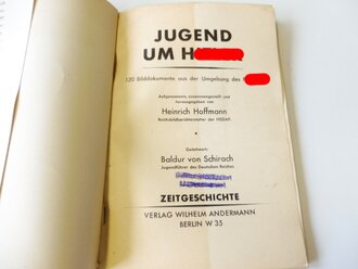 "Jugend um Hitler" 120 Bilder von H.Hoffmann. DIN A5, im Schutzumschlag. Innen an 5 Stellen leicht vermalt