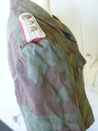 Tarnjacke Wehrmacht aus italienischem Material. Leicht getragenes Stück in gutem Zustand, Schulterbreite: 46 cm, Armlänge 58 cm