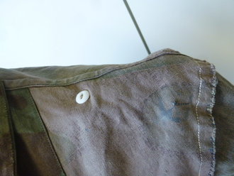 Tarnjacke Wehrmacht aus italienischem Material. Leicht getragenes Stück in gutem Zustand, Schulterbreite: 46 cm, Armlänge 58 cm
