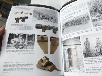 German Paratroopers, Uniforms and Equipment 1936-1945. Volume II : Helmets, Equipment and Weapons. 365 pages, unopened example. Text is in English - unlike the pictures from the inside ( We simply used the same pics than for the German listing )