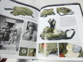 German Paratroopers, Uniforms and Equipment 1936-1945. Volume II : Helmets, Equipment and Weapons. 365 pages, unopened example. Text is in English - unlike the pictures from the inside ( We simply used the same pics than for the German listing )