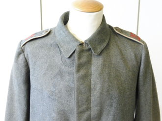 1. Weltkrieg, feldgraue Feldbluse für Mannschaften M15. Wohl nach dem 1.Weltkrieg weitergetragenes Stück (u.a. Brusttaschen ergänzt ) und zum Teil wieder rückgebautes Stück mit ergänzten originalen Schulterklappen.