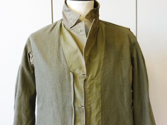 US WWII, M41 Field Jacket. Well used, good size, Original patch but resewn, shoulder width 49 cm, arms length 61 cm