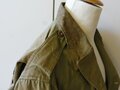 US WWII, M41 Field Jacket. Well used, good size, Original patch but resewn, shoulder width 49 cm, arms length 61 cm