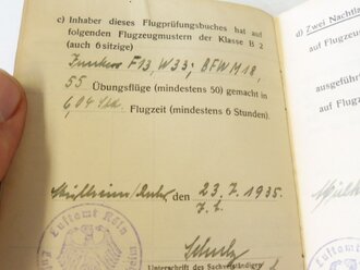 Ritterkreuzträger Major Erich Hohagen, Staffelkapitän JG51 Me 109. Persönliches Flugprüfungsbuch, Versetzungsgesuch mit eigenhändiger Unterschrift sowie diverse Originalfotos.