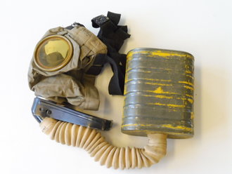 U.S. Army WWI, Gas mask in bag, Mask is soft, tube dry. Comes in a 1917 dated bag with anti-dimming compound and Instruction book. Issued to a Machine Gun member of 26. Infantry Div. on 21. Aug.1918 so he could have been in the Battle of Saint-Mihiel