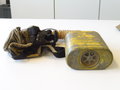 U.S. Army WWI, Gas mask in bag, Mask is soft, tube dry. Comes in a 1917 dated bag with anti-dimming compound and Instruction book. Issued to a Machine Gun member of 26. Infantry Div. on 21. Aug.1918 so he could have been in the Battle of Saint-Mihiel