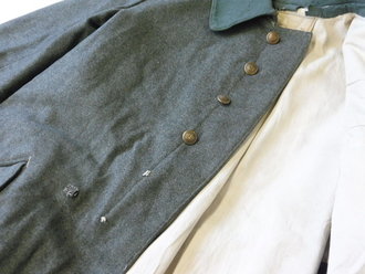 1. Weltkrieg, feldgrauer Mantel M15 , Kammerstück des BA XVIII 1917. Guter Zustand, kleine Flickstelle an der resten Schulter