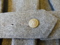 1. Weltkrieg, feldgrauer Mantel, Kammerstück datiert 1915, etliche Mottenschäden