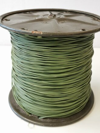 U.S.  Signal Corps DR-8 A wire spool with wire. Regarding to the dark green colour I assume this one could be dated somewhere between to 50-70´s