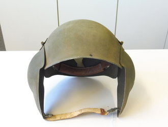 U.S. A.A.F. Anti Flak helmet. Besides the chin strap in...
