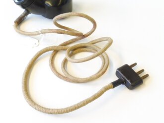 Handapparat Hap2, Hörer für Funkgeräte für vorderste Linie, kann benutzt werden ohne den Stahlhelm abzusetzen.
